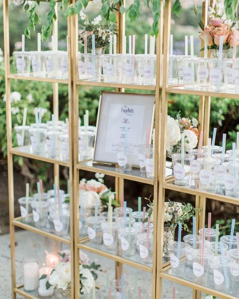 Are you and your fiancé bubble tea fanatics? Repurpose sippy cups as escort cards. Guests can fill 'em up with their tea flavor of choice at the adjacent boba station (that should go in right next door!). Boba Station, Boba Partea, Bar For Wedding, Mario Wedding, Boba Bar, Coffee Bar Wedding, Wedding Drink Station, Signature Cocktails Wedding, Gold Shelves