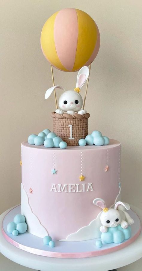 13. Cute bunny in hot air balloon cake Children’s parties are easy and fun to plan. All you have to do is to decide... Hot Balloon Cake, Baby Girl 1st Birthday Cake Ideas, Balloon Cake Ideas, Bunny Cakes Birthday Kids, Birthday Cake For First Birthday, Fondant Hot Air Balloon, 1st Birthday Cake Design, 1 St Birthday Cake, Hot Air Balloon Birthday Cake