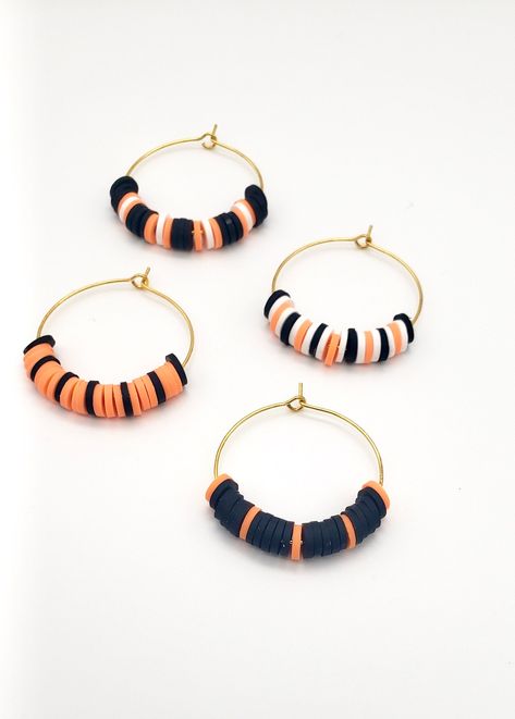 These multicolored Halloween-themed handmade hoop earrings are lightweight and come in a variety of hoop styles, color designs, and sizes. I use heishi beads which are made of soft polymer clay that is smooth, lightweight, and waterproof. Ear wire and hoop wire options will be half filled. These are made-to-order, meaning every order is made custom for you. Colors may vary. Halloween Heishi Earrings, Clay Bead Hoop Earrings, Heishi Earrings Diy, Clay Bead Earing Ideas, Clay Bead Earrings Ideas, Clay Beads Earrings, Halloween Earrings Diy, Diy Hoop Earrings, Heishi Bead Earrings