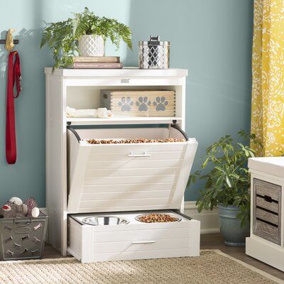 This double food bowl storage container is the perfect space-saving solution for your home. Store the dog food in the angled door pantry, then pull out the bottom drawer at feeding time to reveal two stainless steel bowls. No more stepping in food and water bowls that are always underfoot, or having dogs snack all day: you can tuck away the food bowls when they're not in use. Plus, it's much more attractive than stray bits of kibble and a loose bag of dog food. Color: White | Archie & Oscar™ Puppy Space, Dog Food Station, Seattle Apartment, Dog Storage, Dog Room, Hedgehog Pet, Dog Kennels, Pet Food Storage, Bowl Food