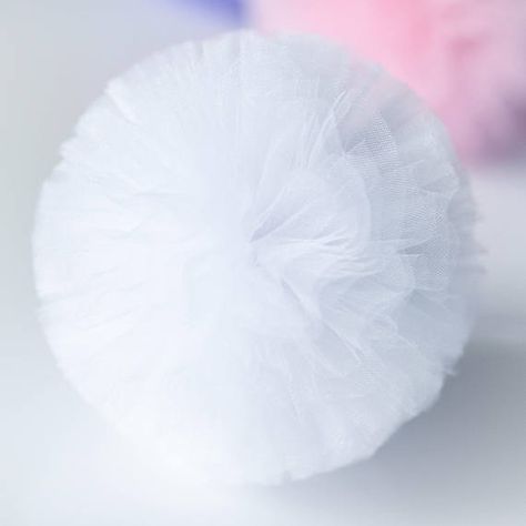 Beautiful , hand made full, perfectly round tulle pompoms in selected size: Extra large 15 / 40cm Large: 12/30cm Medium size 8/20cm Small pompoms 5/13cm. Color: Shimmery White Fabric: soft bridal tulle. Each pompom is strung with coordinating ribbon for hanging. If you a re looking White Pom Pom Flower, White Pompom Hair Clip, Big Pom Pom, Tulle Pompoms, Tulle Pom Pom, Wedding Pom Poms, Pom Pom Balls, Tulle Poms, Fabric Balls