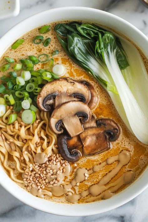 A photo of a  Vegan Sesame Ramen a Vegan Ramen Asian Meals Vegetarian, Korean Ramen Vegetarian, Vegan Mushroom Ramen, Veggie Miso Ramen, Asian Soup Vegetarian, Ramen Recipes Vegan, Easy Ramen Recipes Vegetarian, Asian Dishes Vegetarian, Vegan Broth Recipe