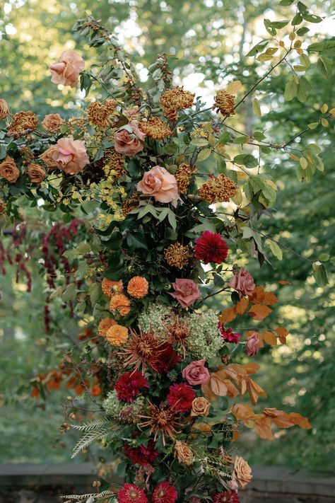 warm + romantic wedding ceremony floral arch featuring terracotta, scarlet, and orange flowers Fall Leaf Wedding Arch, Floor Alter Flowers, Fall Wedding Arch, Musical Couple, Ceremony Floral Arch, Wedding Ceremony Floral Arch, Flower Wedding Arch, October Weddings, Fall Leaf Wedding