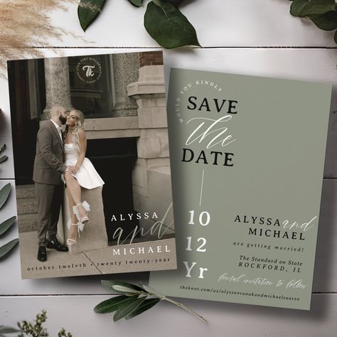 This elegant and simple black, sage green, and white modern typography wedding save the date, features a hero cover photo with bride & groom names, oversized "and" in sage green, and spelled-out wedding date wording overlay, along with save the date half circle wording and modern design details, including wedding website, on the back over a beautiful solid sage green background. Personalize the wording for your big day, easily upload your photo! You may even edit / adjust placement of design com Photos For Wedding Invitations, Fall Wedding Ideas Sage Green, Sage Green Wedding Invitations Rustic, Modern Sage Green Wedding, What To Include On Save The Dates, Sage Green Black And White Wedding Theme, Green Country Wedding Theme, Dark Green Romantic Wedding, Green And Cream Wedding Invitations