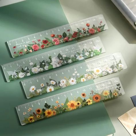 2.89 - USE CODE MAINE23 FOR 10% OFF! Freshen up your stationery collection with this plastic ruler that would vibe well with a cottagecore lifestyle! Showcasing a pressed flower-style print against a clear background, it’s sure to boost your mood during long tutorials. Cottagecore Lifestyle, Roller Design, Gel Ink Pens, Boost Your Mood, Clear Background, Stationery Collection, Beauty Packaging, Cute Stationery, Flower Fashion