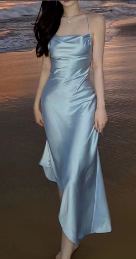 Aesthetic Blue Halter Silk Satin Maxi Dress. https://pradize.com/collection/classy-evening-maxi-dresses-long-formal?menu= Dresses With Ruffles Classy, Formal Mid Length Dress, Light Blue Satin Dress Long, Blue Formal Outfit, Blue Dinner Dress, Satin Dress Outfit, Sleeveless Blue Dress, Promotion Dresses, Silk Party Dress