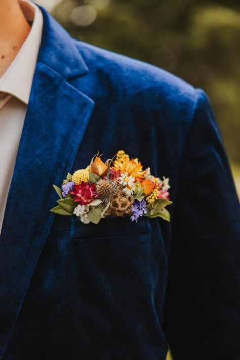 Wildflower wedding at a rustic Montana venue in Eureka. Wild Flower Pocket Square, Wildflower Pocket Square, Navy And Wildflower Wedding, Groomsmen Pocket Square Flowers, Wildflower Groomsmen Attire, Colorado Wildflower Wedding, Flower Pocket Square Wedding, Wild Flower Corsage, Wildflower Tie