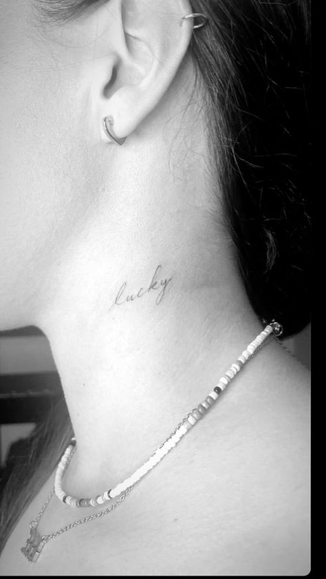 Lucky tattoo, fine line Lucky In Cursive Tattoo, Lover Fine Line Tattoo, Lucky Small Tattoo, Lucky Font Tattoo, One Word Fine Line Tattoo, Lucky Cursive Tattoo, Lucky Neck Tattoo, Fine Line Back Of Neck Tattoo, Lucky Fine Line Tattoo