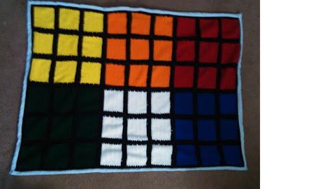 "This retro style Rubik's cube throw takes around a week to complete.It is made with beginning chain stitches, double crochet, slip stitches, and whip stitch sewing with a yarn needle. The finished size is around 4 ft x 5 ft." Easy Afghan Crochet Patterns, Granny Square Afghans, Free Crochet Blanket Patterns, Slip Stitches, Crochet Square Blanket, Intarsia Patterns, Rubix Cube, Whip Stitch, Crochet Afghan Patterns Free