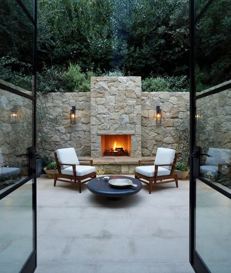 Canyon Farmhouse | William Hefner William Hefner, Sandstone Fireplace, Family Backyard, Living Room Tiles, Sophisticated Decor, Large Backyard, Fire Features, Outdoor Tiles, Outdoor Fireplace