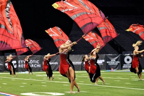 I Do Color Guard – The Sport No One Knows Exists | Her Campus Colorguard Hairstyles Color Guard, Color Guard Tips, Marching Band Shows, Color Guard Flags, Colour Guard, High School Marching Band, State Champs, Stadium Lighting, Winter Guard