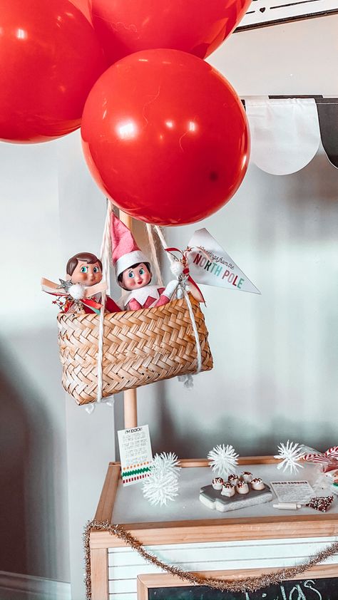 Hot air balloon your elf in from the north pole! Elf In A Box Ideas, Elf Shoe Train, Paper Airplane Elf On Shelf, Elf On Shelf Photo Shoot, Elf I’m Back Balloon, Ballerina Elf On The Shelf Ideas, Elf Snow Globe, Elf On The Shelf Hot Air Balloon Diy, Elf On Shelf Hot Air Balloon