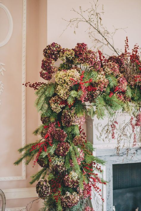 Christmas decorating with plants & foliage | House & Garden Dried Hydrangeas, Christmas Flower Arrangements, Christmas Plants, Christmas Preparation, Flower Shops, Winter Plants, Christmas Mantle, Christmas Mantels, Christmas Flowers