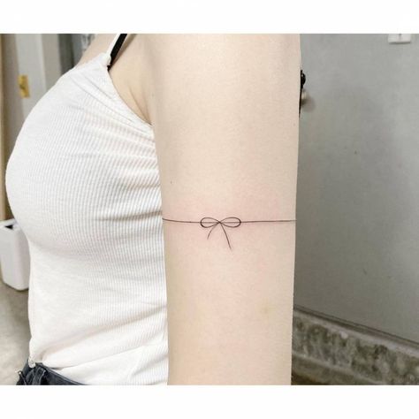 Ribbon Bracelet Tattoo, Two Line Tattoo Arm, Fine Line Ribbon Tattoo, Minimalist Back Tattoos, Line Tattoo Men, Arm Bracelet Tattoo, Fine Line Tattoo Men, Key Tattoo Designs, Around Arm Tattoo