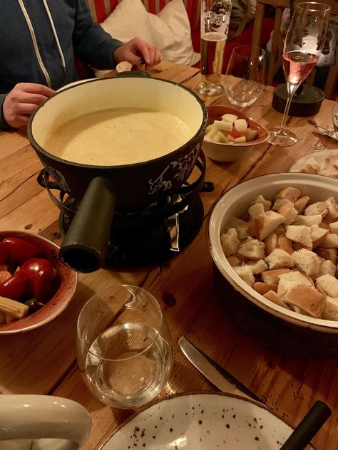 [I ate] Cheese Fondue Switzerland Cheese Fondue, Cheese Fondue Aesthetic, Fondue Aesthetic, Fondue Table, Fondue Dinner Party, Cheese Fountain, Fondue Restaurant, Cozy Aesthetics, Fondue Dinner