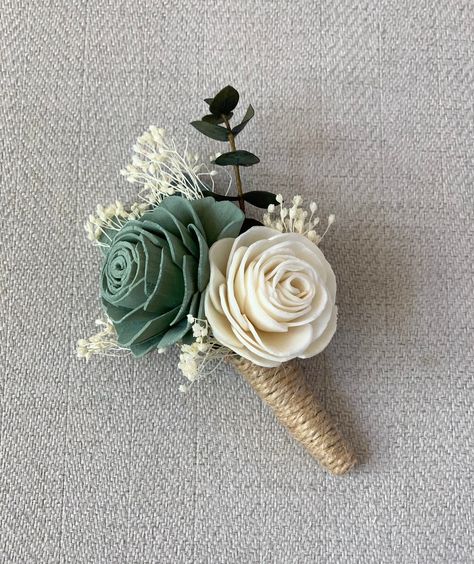 This Mini Bouquet and Boutonniere Bundle will brighten your special day! These beautiful flowers are made from wood that comes from the tapioca plant root, with proper care they can last a lifetime! No two flowers are exactly the same, each flower is unique. Mini Bouquet measures approx. 6″ inches across and approx. 10″ inches tall. Double flower Boutonniere measures approx. 4.5″ tall. Need a different color, a matching wrist tie-on corsage or hair comb? Happy to help! Please contact me. Your bo Sage Green Boutonniere, Hunters Wedding, Unique Boutonniere, Tapioca Plant, Retreat Decor, Green Boutonniere, Wooden Flower Bouquet, Sage Green Flowers, Confirmation Party