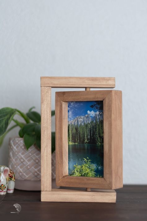 Dowels and 1X2s are all you need to make this DIY gift idea. A rotating picture frame makes great home decor to display multiple pictures at the same time. Get the plans and build it today! Build A Picture Frame, Cross Cut Sled, Dowel Jig, Miter Saw Table, Plexiglass Sheets, Outdoor Wood Projects, Pictures Frames, Build A Frame, Multiple Pictures