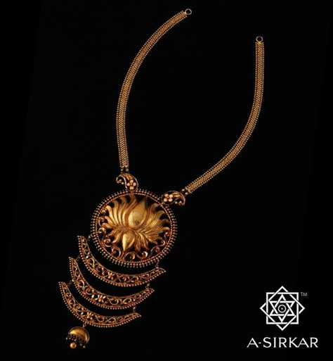 Paris-Para'r Padma Necklace:Based in a place called Paris Para, the distinguished customer who commissioned this ornament has trusted us to make three jewels, all with a large lotus in the centre, for their resident deity - Ma Lakshmi. This piece, hand-wrought in natural yellow 22K gold using chaste naksha and chain-work, and imparted a dark vermilion polish, is the first of the trio. We believe the numen of Paris Para, Padma Ma, is pleased with our efforts. And sincerely hope you too. A Sirkar Jewellers Gold, Lotus Jewelry Gold, Bengal Jewellery, A Sirkar, Bengali Gold Jewellery, Ma Lakshmi, Bengali Jewellery, Marriage Jewellery, Wedding Ornaments