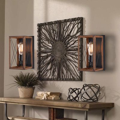 Ideals for any hallway, kitchen, living room, bedroom, this 1-light indoor wall lantern with Matte black & Barnwood accents emits a cozy rustic glow through an X-brace design fits for a any decor from industrial to farmhouse, thus coordinating and complimenting the exterior of your home. Its rectangular opened-cage is crafted from a blend of metal, aluminum and features a faux-wood accents with a rich painted finish. It also ideals for real farmhouse, rustic, industrial. With one incandescent bu Barnwood Accent Wall, Decorative Wall Sconces, Broken Bow, Candle Wall Sconces, High Walls, Bronze Metal, Wall Candles, Small Wall, White Candles