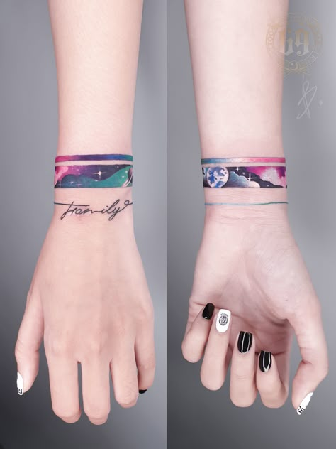 Tattoo for women from B9 Studio. #Colortattoo #womentattoo #galaxytattoo #galaxydesign #galaxytattooforhand Hot And Cold Tattoo Ideas, Tattoos Pulseras, Tato 3d, Wrist Band Tattoo, Cuff Tattoo, Band Tattoo Designs, Armband Tattoo Design, Galaxy Tattoo, Muster Tattoos