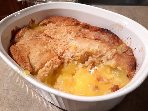 Easy Lemon Cobbler Recipe: This Lemon Cobber Recipe Really Is Magic | Desserts | 30Seconds Food Easy Magic Lemon Cobbler, Lemon Cobbler Recipes, Easter Dessert Lemon, Magic Lemon Cobbler, Magic Desserts, Lemon Cobbler, Cherry Cobbler Recipe, Cobbler Recipes Easy, 30seconds Food