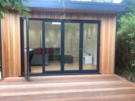 Beautiful cedar clad garden room with large decking area and additional storage room Hampton Garden, Garden Lodge, Silo House, Sips Panels, Cedar Garden, Decking Area, Living Room Table Sets, House Deck, Modern Patio