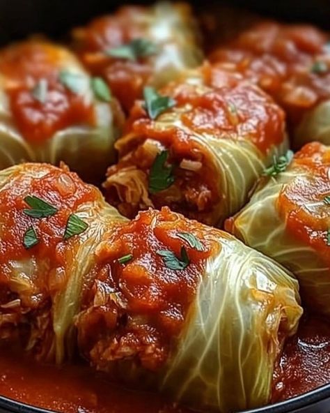 🌿 Stuffed Cabbage Rolls 🍚 Ingredients: 1 large head of cabbage 🥬 1 lb ground beef (or turkey) 🍖 1 cup cooked rice 🍚 1 onion, finely chopped 🧅 2 cloves garlic, minced 🧄 1 can (15 oz) tomato sauce 🍅 1 can (14.5 oz) diced tomatoes 🍅 1 tablespoon Worcestershire sauce 🌿 Salt and pepper to taste 🧂 Optional: fresh parsley for garnish 🌿 Instructions: Prepare the Cabbage: Bring a large pot of salted water to a boil. Carefully remove the core from the cabbage and submerge the head in boiling water for ... Polish Stuffed Cabbage Rolls, Vegetarian Cabbage Rolls, Polish Stuffed Cabbage, Jamaican Oxtail Stew, Stuffed Cabbage Rolls Recipe, Stuffed Cabbage Rolls, Lemon Pound Cake Recipe, Cabbage Rolls Recipe, Pumpkin Cake Recipes