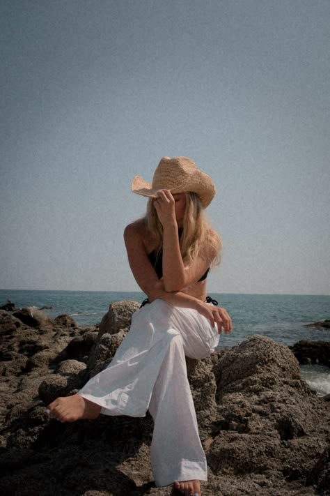 Coastal cowgirl, beach aesthetic, beach vibes, Coastal cowgirl aesthetic, cowgirl, boho style, bougie vacay, cowboy hat, cowboy boots, summer pictures, summar poses, beach poses, beach cowgirl, white linen pants, beach outfits, amalfi coast outfits, european summer, tropical summer aesthetic, summer '23 fashion, beach poses, coastal granddaughter, cowgirl outfits, country aesthetic, cowboy hat outfit, summer aesthetic, outer banks, beach pants, beach coverup, parachute pants California Coastal Outfits, Coastal Cowgirl Photoshoot, Coastal Cowboy Aesthetic, Tropical Summer Aesthetic, Aesthetic Cowboy Hat, Cowboy Boots Summer, Linen Pants Beach, Cowboy Hat Outfit, Coastal Cowgirl Outfit