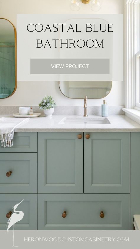 This bathroom is a serene coastal retreat. The sea glass-inspired blue cabinetry creates a calming atmosphere, complemented by luxurious gold finishes. The shower tile, perfectly matched to the cabinetry color, ties the space together with a seamless flow. Every detail has been thoughtfully curated, balancing elegance and tranquility to create a space that feels like a breath of fresh air.

#LuxuryHomes #HomeDesign #CustomCabinetry #VancouverIslandHomes #LuxuryBathrooms #CustomBathroom Coastal Bathroom Cabinets, Sea Salt Bathroom Cabinets, Sea Salt Bathroom, Blue Bathroom Cabinets, Blue Cabinetry, Woodlawn Blue, Sea Glass Colors, Coastal Bathrooms, Heritage House