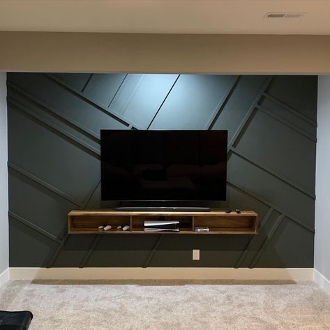 Tv On Dark Accent Wall, Wood Accent Wall For Tv, Accent Wall Behind Tv Wallpaper, Tv Room Accent Wall Ideas, Geometric Tv Wall Design, Feature Tv Wall Ideas Living Room, Wall Paneling Behind Tv, Accent Walls With Tv, Matte Black Accent Wall Living Room