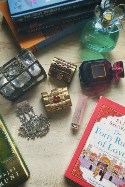 Desi aesthetic. Forty rules of love. Tote bag. Dior. Jhumkas. Desi ig story. Pakistani. Delhi. Silver Jewellery. Wooden boxes. Indian art. Traditional jewellery. Jewellery box. Oxidized jhumke. Palace of illusions. Geetanjali shree. Perfume. Oud. Jasmine. Rumi. Shamz of tabriz book. Poetry. Indian books. Desi vibe. Dilli 6 Forty Rules Of Love Aesthetic, 40 Rules Of Love, Elif Shafak, Forty Rules Of Love, Dazz Cam, Book Coffee, Coffee Candle, Book Annotation, Love Aesthetic