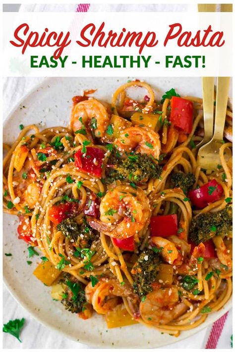 Spicy Shrimp Pasta. A fast, flavorful, healthy shrimp recipe! With garlic, lots of veggies, whole wheat spaghetti, and an easy tomato sauce, this is one of our go-to weeknight main dishes. #wellplated #pasta #shrimp #dinner #healthy Spicy Shrimp Pasta Recipes, Spicy Seafood Pasta, Seafood Pasta Sauce, Garlic Shrimp Pasta Recipes, Spicy Shrimp Pasta, Pasta Sauce Recipes Tomato, Spicy Spaghetti, Shrimp Pasta Recipe, Spicy Prawns