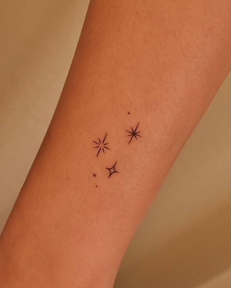 Minimalistic stars tattoo located on the wrist. 3 Stars Tattoo Wrist, 4 Star Tattoos For Women, North Star Minimalist Tattoo, 3 Tiny Stars Tattoo, Star Micro Tattoo, Small Tattoo Ideas Stars, Small Star Wrist Tattoos, 6 Stars Tattoo, Star Hands Tattoo