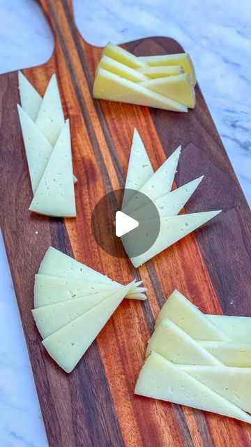 Emily Love Leserman on Instagram: "five ways to style triangle cuts of cheese⁣ ⁣ 1. the zipper⁣ 2. the braid⁣ 3. the burst⁣ 4. the fan⁣ 5. the tipsy zipper ⁣ ⁣ try one of these easy styles and tag me when you do! ⁣ ⁣ love,⁣ em" Fruit Cheese Platter Ideas, Charcuterie Board Small Easy, Cheese Cuts For Charcuterie, How To Cut Cheese Into Triangles, Different Ways To Cut Cheese For Charcuterie Board, Party Food Platters Ideas, How To Cut Triangle Cheese, Cheese And Cracker Charcuterie Board, How To Cut Cheese