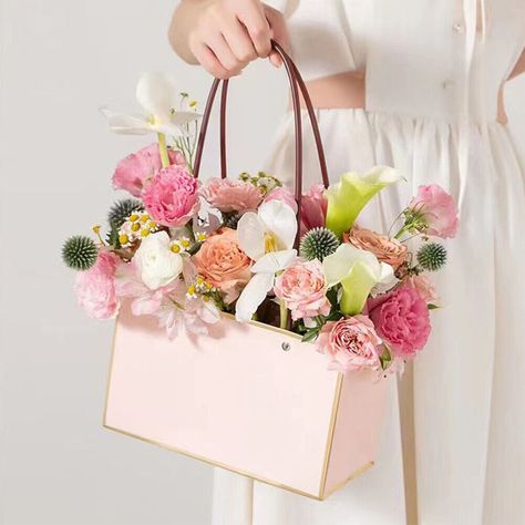 Description: 【PACKAGE CONTENT】You will receive 5pcs paper flower gift bags, 3 colors(white, pink, black) for your choice, about 22x10.5x13.5cm/8.66x4.13x5.31inch(LxWxH), enough quantity for your daily use. 【FLORAL ARRANGEMENT】Specially designed for flower packaging, the rectangular shape is suitable for storing bouquets, small potted plants, succulents, green plants, etc. The flower basket allows the flowers to stretch easily and flexibly. 【SAFE MATERIAL】Made of durable paper, safe and environme Paper Bag Flowers, Bouquet Bag, Flower Handbag, Plants Succulents, Waterproof Paper, Paper Flower Decor, 2025 Wedding, Paper Bouquet, Rose Party