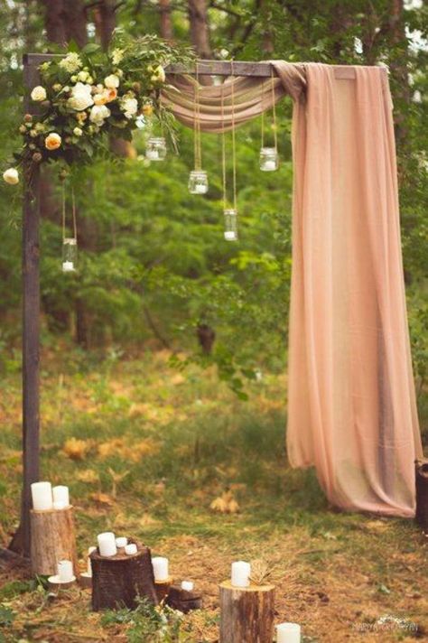 fabric draped wedding arch with floral and hanging manson jar lights Photoboth Mariage, Manson Jar, Fall Wedding Arches, Wedding Arches Outdoors, Diy Wedding Arch, Wedding Arch Rustic, Rustic Wedding Decorations, Wedding Ceremony Arch, Outdoor Fall Wedding