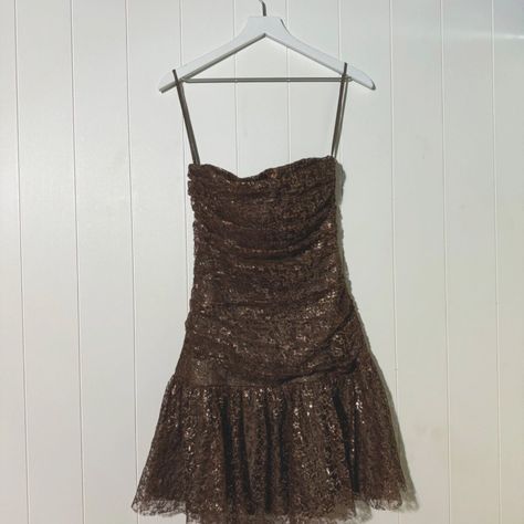 Betsey Johnson Evenig Dress Women's 6 Nwt Brown Sequin Lace Strapless Cocktail Shimmering Brown Cocktail Dress With Intricate Sequin Lace Design. Strapless, With A Flared Hem For A Touch Of Elegance. Shimmering Sequin Lace Strapless Design Flared Hem Adjustable Spaghetti Straps Zipper Closure At The Back Knee-Length Cocktail Dress, Brown Dress, Sequin Dress, Lace Dress, Strapless Dress, Flared Hem Dress, Evening Wear, Party Dress, Fashion, Elegant Dress, Formal Dress, Knee-Length Dress, Shimmering Dress Condition: New With Tags Size: Womens S Approximate Flat Lay Measurements: Bust 13.5 In Length 34 In *Bundle Items For Discount And Pay One Shipping Charg Halloween Themed Hoco Dress, Brown Hoco Dresses, 80s Hoco Dress, Winter Hoco Dresses, 20s Dresses Gatsby, Brown Hoco Dress, Fall Homecoming Dresses, Vintage Hoco Dress, Unique Hoco Dresses