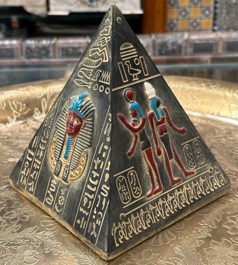 lovely Egyptian pyramids
This fine work is made of solid, lightweight colored fiberglass, inscribed with the most important and beautiful pharaonic symbols, The weight of the pyramid is about 1 kg. Pharaonic Symbols, Sphinx Mythology, Egyptian Inspired Jewelry, Egyptian Home Decor, Egyptian Deity, Egyptian Kings, Egyptian Inspired, Egyptian Artifacts, Handmade Statue