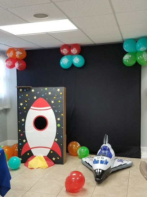 Rocket Photo booth and inflatable space ship. Birthday decoration outer space theme party Outer Space Photo Booth, Space Theme Outdoor Party, Rocket Ship Birthday Space Theme, Space Themed Photo Booth, Rocket Ship Photo Booth, Rocket Ship Cutout, Outer Space Decor, Space Decorations, Space Theme Party Decorations