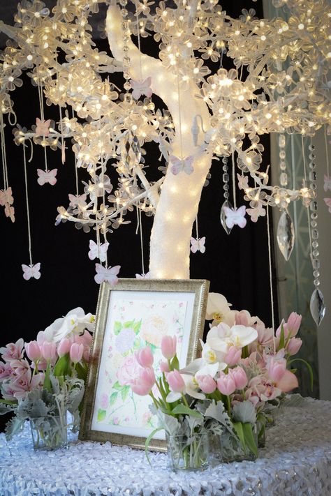 Lighted Wedding Reception Centerpiece with Hanging Butterflies Center Piece For Sweet 16 Party, Quince Center Piece Ideas Butterfly, Spring Sweet 16 Themes, Butterfly Theme Quinceanera, Butterfly Quince Dress, Blush Champagne Wedding, Butterfly Quinceanera Theme, Butterfly Sweet 16, Butterfly Quince