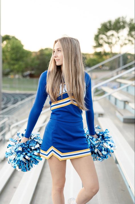 Highschool cheer photo idea Blue And Yellow Cheer Uniform, Highschool Cheer Pictures, Cheerleading Outfits Aesthetic, Highschool Cheer, Cheerleading Senior Pictures, Kate Beckinsale Hair, Cheerleader Uniforms, Cheer Photo, Cheer Photography