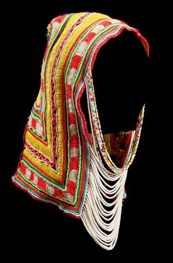 Bedouin headwear Size (cm):33 x 15 Place of origin:Saudi Arabia Region, group, style:Medina Date of object:1970's? Material(s):Calico, beads Techniques:Embroidery, beading Rectangle of black calico folded in half and lined with white calico. It has the corners turned to form the back. It is decorated with yellow embroidery worked in lines and zig-zags. The stitches are: chain, wide herringbone, satin Cretan and blanket stitch. It is further decorated with chains of small beads across the front. Halloween Candy Crafts, Vintage Asian Art, Mad Hat, Funky Hats, Yellow Embroidery, Theatre Costumes, Folk Dresses, Diy Notebook, Creative Pictures