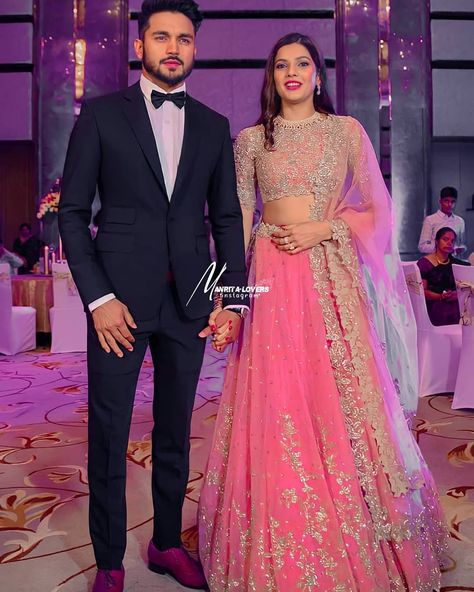 Pink Lehenga Couple Combination, Pink Lehanga Combinations With Groom, Pink Bridal Lehenga With Groom, Ashrita Shetty, Pink Reception Dress, Reception Stills, Manish Pandey, Event Advertisement, Indian Wedding Dress Traditional