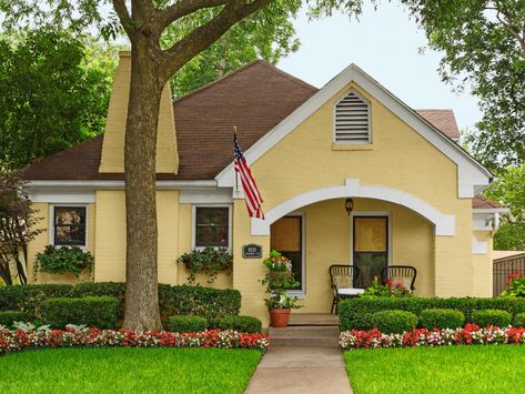 This adorable yellow home with open front porch is how Dallas, TX does #curbappeal. #hgtvmagazine http://www.hgtv.com/design/outdoor-design/landscaping-and-hardscaping/copy-the-curb-appeal-dallas-tx-pictures?soc=pinterest Yellow House Exterior, Exterior Color Palette, Exterior House Colors Stucco, Exterior House Color, Hgtv Magazine, Tudor Style Homes, Pintura Exterior, Exterior Paint Color, Yellow House