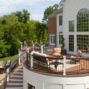 Outdoor Oasis - Chantilly Project - Lauren Nicole Designs - Interior Design in Charlotte, NC Double Stairs, Backyard Improvements, Curved Deck, Staircase Outdoor, Deck And Patio, Deck Seating, Double Staircase, Lauren Nicole, Deck Backyard