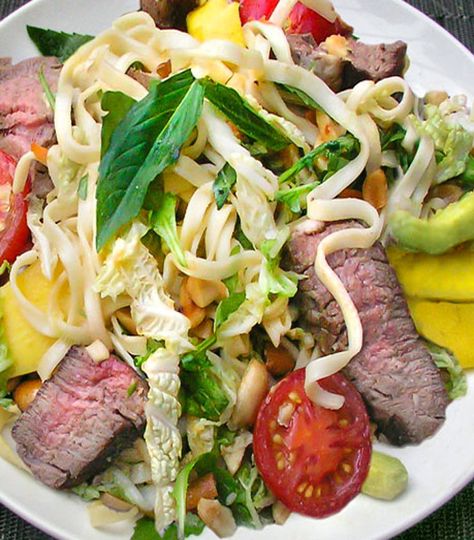 This Thai Steak and Noodle Salad is a copycat recipe of the famous Houston's/Hillstone Thai steak and noodle salad which has to be one of the all time BEST salads in the world. #ThaiSalad #SteakSalad #GlutenFree #SteakRecipes Steak And Noodles, Thai Beef Noodle Salad, Thai Steak, Best Salads, Thai Beef, Pork Salad, Thai Salads, Lime Vinaigrette, One Dish Dinners