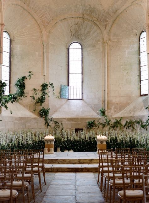 This 12th century chapel was the perfect venue for a romantic, intimate yet grand wedding ceremony in Burgundy. Madame Artisan Fleuriste decorated the altar with lush greens and white to make it seem as if a secret garden had magically blossomed. Image: Joel Serrato #feteinfrance #destinationweddingfrance Chapel Ceremony, Jewish Celebrations, Burgundy France, Indoor Wedding Ceremonies, Chateau Wedding, Ceremony Inspiration, France Wedding, French Wedding, Chapel Wedding