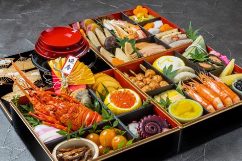 Osechi Ryori: are traditional Japanese foods eaten during the start of the new year.  They are placed in a beautiful multilayer bento called jubako. The foods in this established tradition represent a specific wish for the new year. For example, lotus root symbolizes hope for a good  and happy future without obstacles ahead. This is because the vegetable has holes that you can see through the other side (the future) without obstacles. Japanese New Year Food, Japanese Food Traditional, Sweet Red Bean, Japanese New Year, New Years Traditions, New Year's Food, Japanese Bento, Family Feast, Foods To Eat