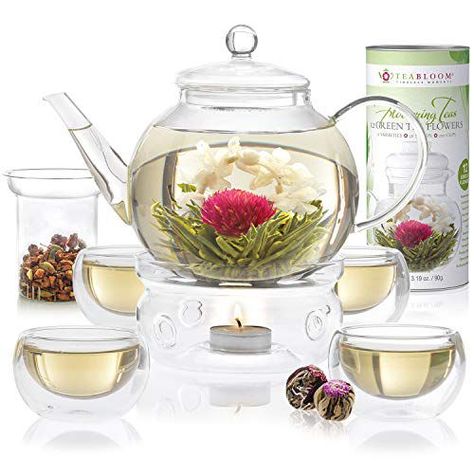 Teabloom's Flowering Tea Set Will Bloom In Hot Water Right Before Your Eyes Flowering Tea, Tea Flowers, Loose Tea Infuser, Tea Warmer, Blooming Tea, Tea Varieties, Tea Gift Sets, Glass Tea Cups, Glass Teapot