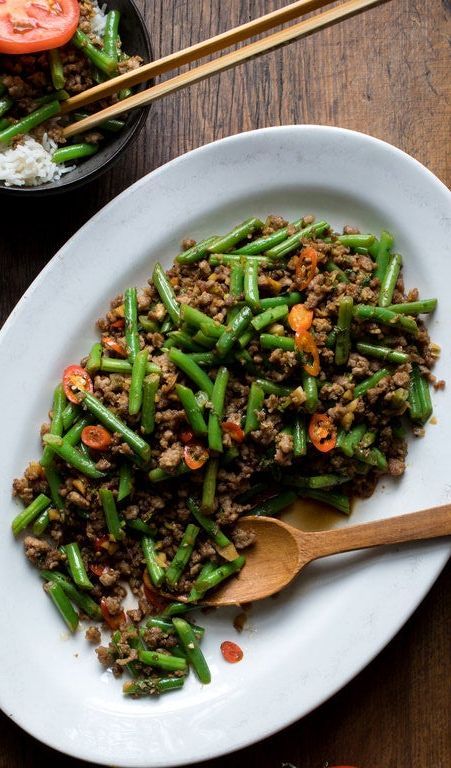 Stir-Fried Green Beans with (ground) Pork and Chiles | Melissa Clark on NYTimes Cooking Midnight Pasta, Beans With Pork, Nytimes Cooking, Pork And Green Beans, Stir Fry Green Beans, Anchovy Pasta, Stir Fry Greens, Ginger Green Beans, Shrimp Cakes